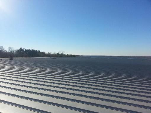 Standing seam metal roof on an Atlanta industrial building