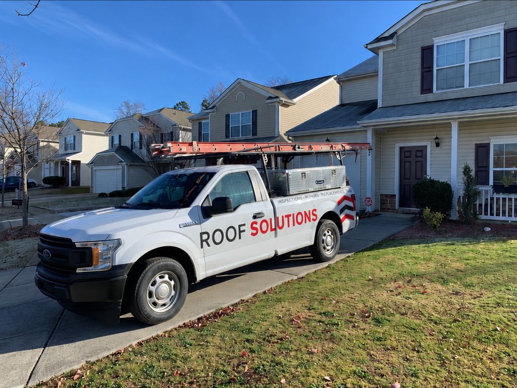 Roof Solutions branded service truck